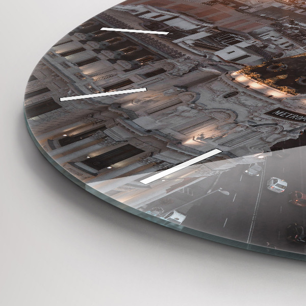 Round glass clock Cities at sunset