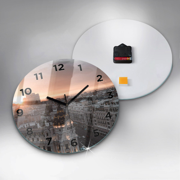 Round glass clock Cities at sunset