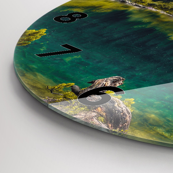 Round glass clock Morskie Oko in the Tatra Mountains