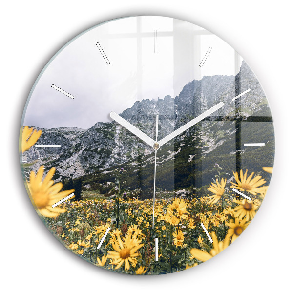 Round glass clock Meadow flowers in the mountains