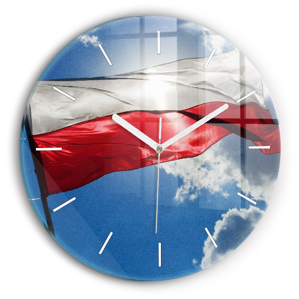 Round glass clock The Polish flag against the sky
