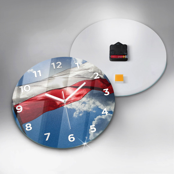Round glass clock The Polish flag against the sky