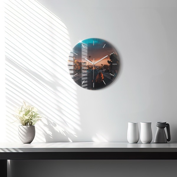 Round glass clock Woman on the road
