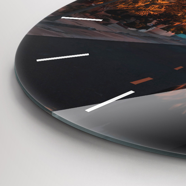 Round glass clock Woman on the road