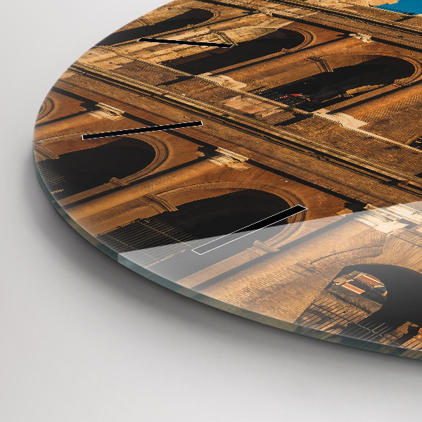 Round glass clock The Colosseum in Italy