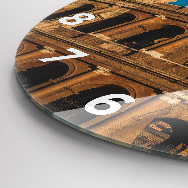 Round glass clock The Colosseum in Italy