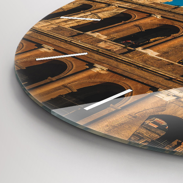 Round glass clock The Colosseum in Italy
