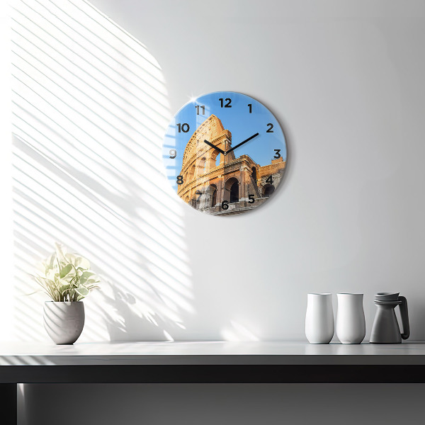 Round glass clock Colosseum in Rome