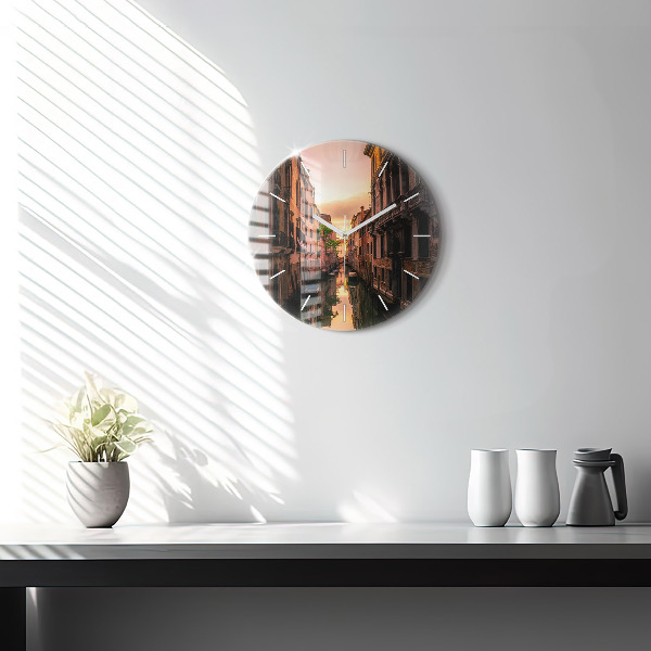 Round glass clock View of the canal in the city