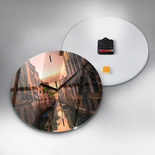 Round glass clock View of the canal in the city