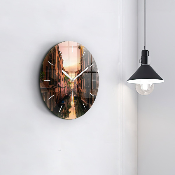 Round glass clock View of the canal in the city