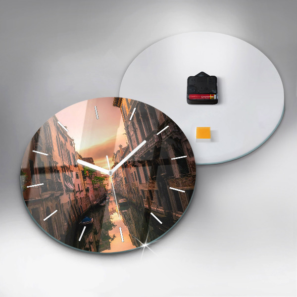 Round glass clock View of the canal in the city