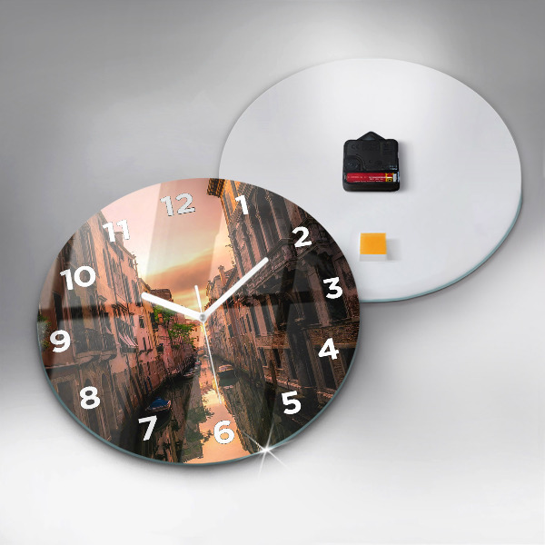 Round glass clock View of the canal in the city