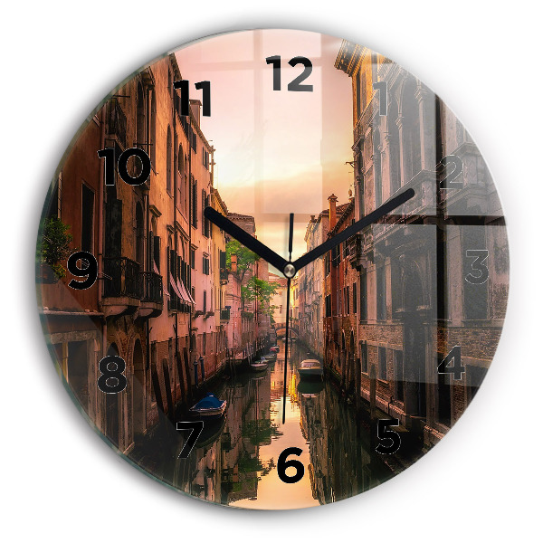 Round glass clock View of the canal in the city