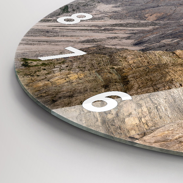 Round glass clock Rocky Mountains