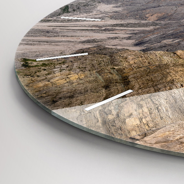 Round glass clock Rocky Mountains
