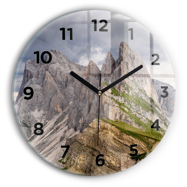 Round glass clock Rocky Mountains