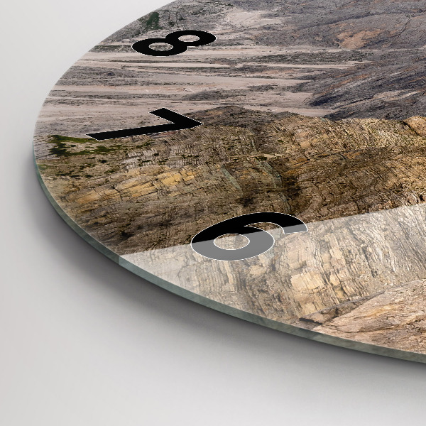 Round glass clock Rocky Mountains