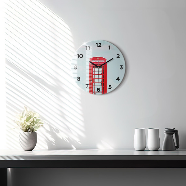 Round glass clock Public phone