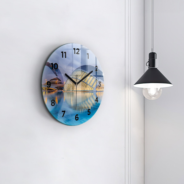 Round glass clock City sunset