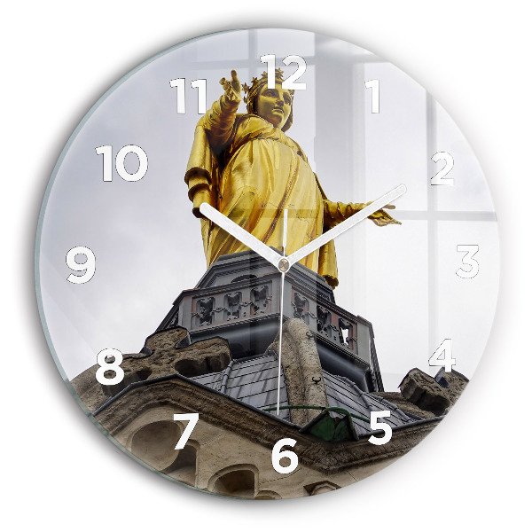Round glass clock Statue of the Virgin Mary in Lyon