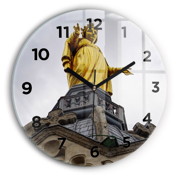 Round glass clock Statue of the Virgin Mary in Lyon