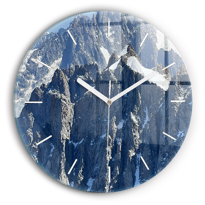 Round glass clock Alps Mountains in Winter