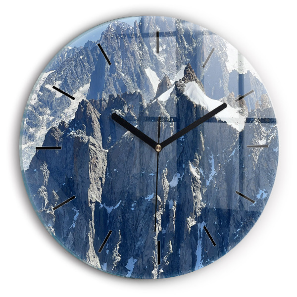 Round glass clock Alps Mountains in Winter