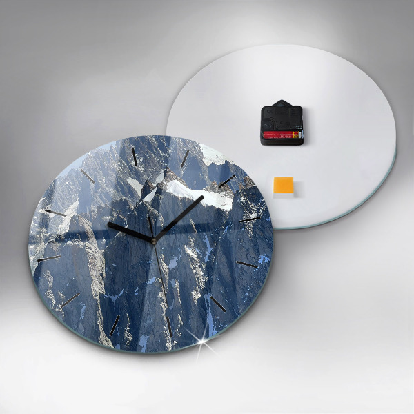 Round glass clock Alps Mountains in Winter