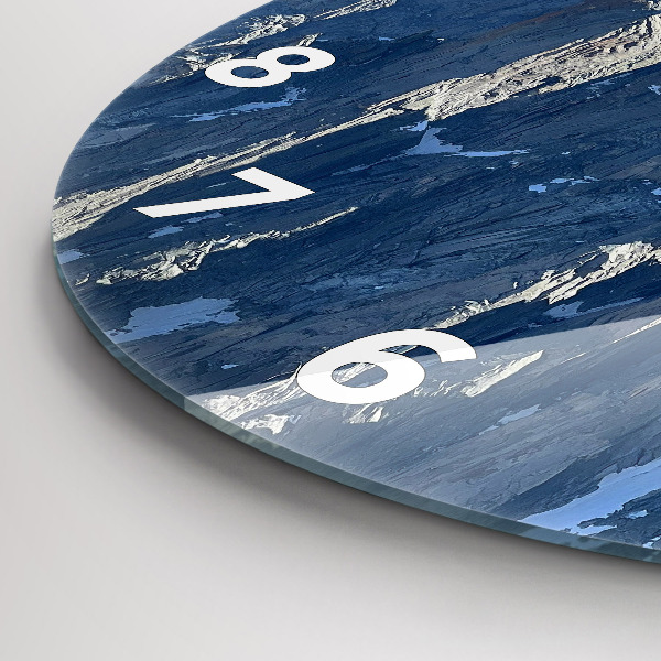 Round glass clock Alps Mountains in Winter