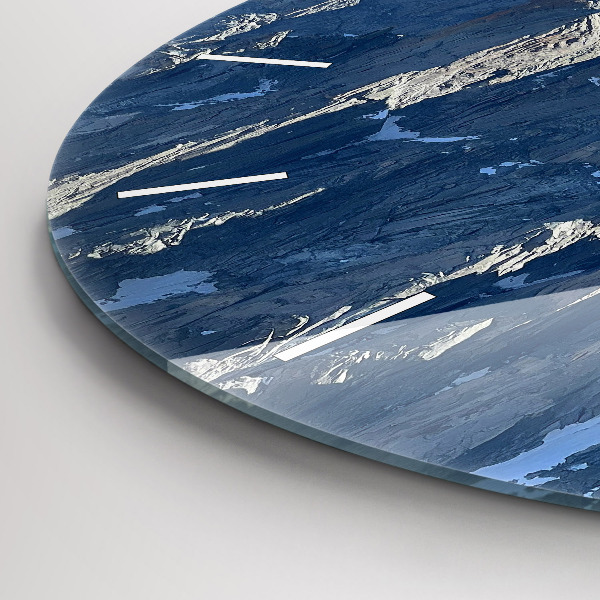 Round glass clock Alps Mountains in Winter