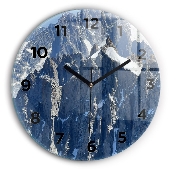 Round glass clock Alps Mountains in Winter