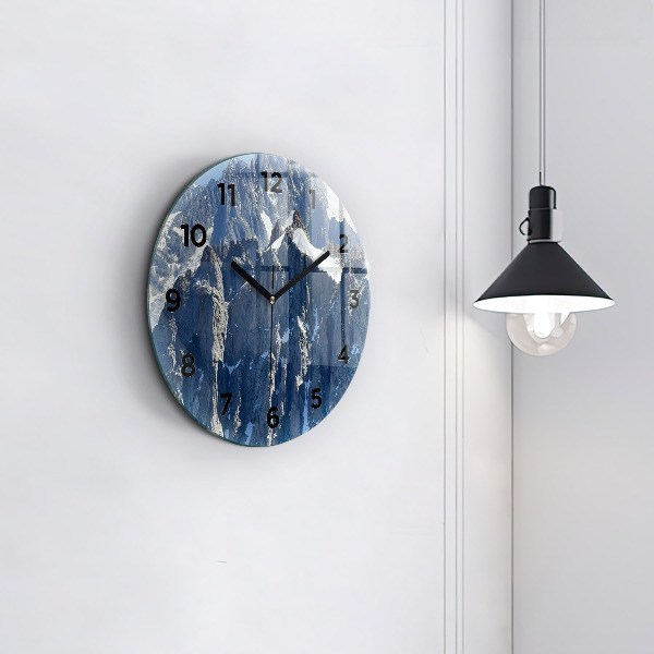 Round glass clock Alps Mountains in Winter