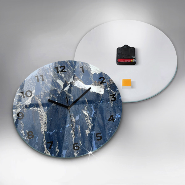 Round glass clock Alps Mountains in Winter