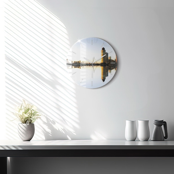 Round glass clock A city on the river