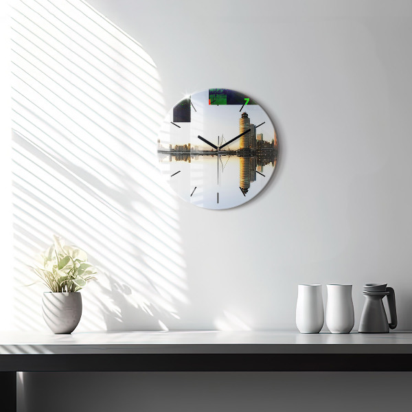 Round glass clock A city on the river