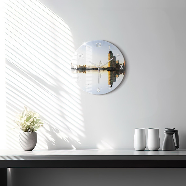 Round glass clock A city on the river