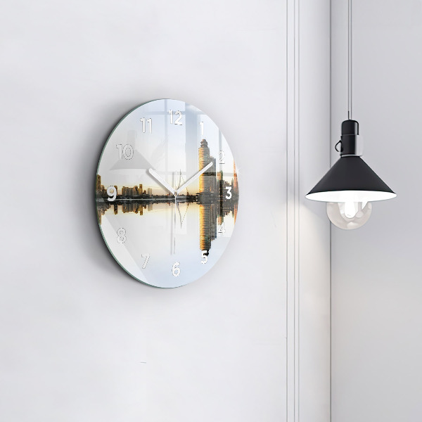 Round glass clock A city on the river