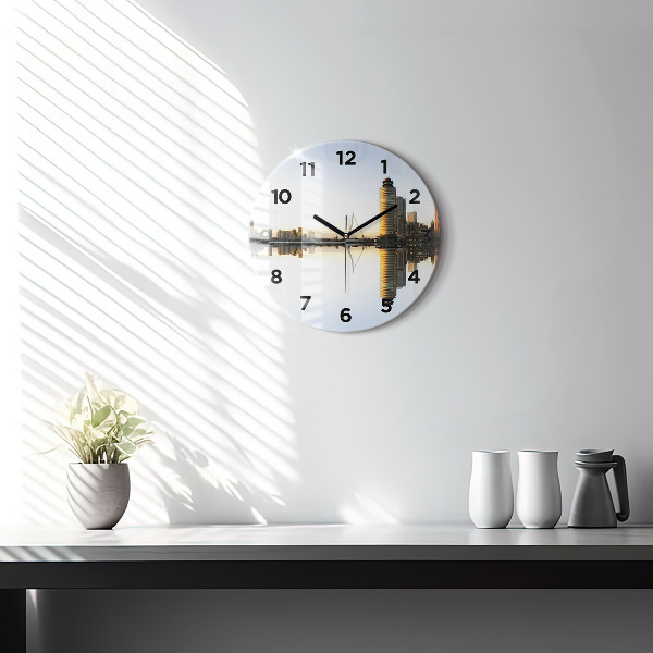 Round glass clock A city on the river