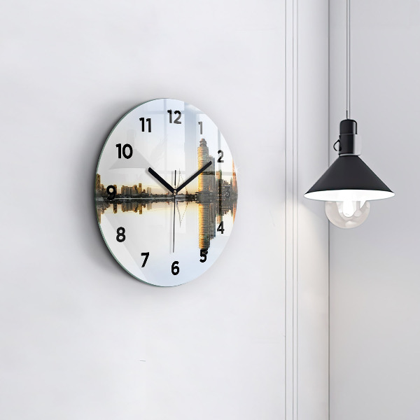 Round glass clock A city on the river