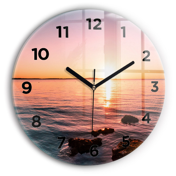 Round glass clock Rocks at sunset