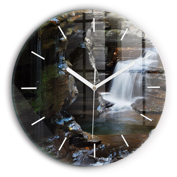 Round glass clock Waterfall and rocks of Iceland