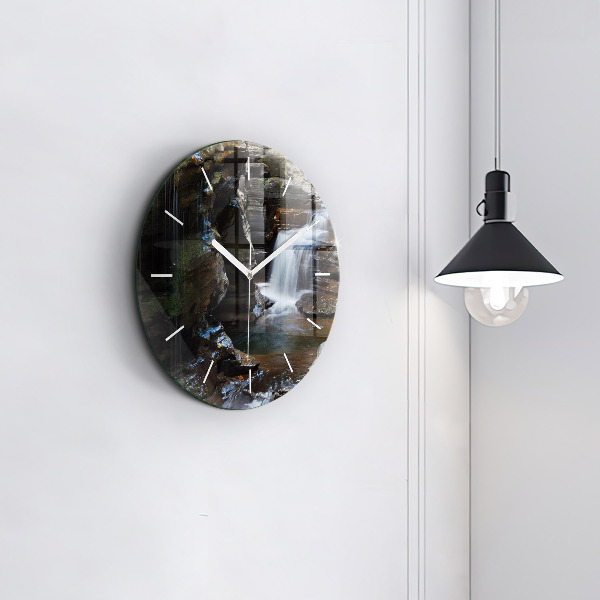 Round glass clock Waterfall and rocks of Iceland