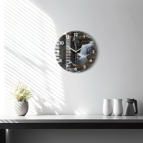 Round glass clock Waterfall and rocks of Iceland