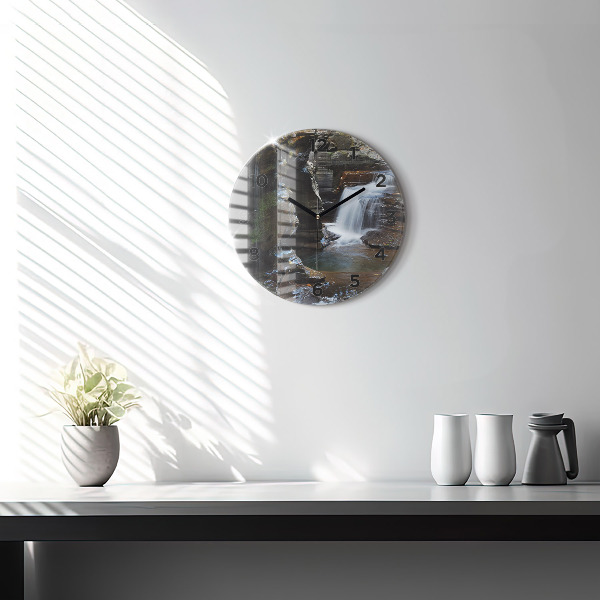 Round glass clock Waterfall and rocks of Iceland