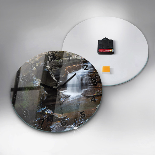 Round glass clock Waterfall and rocks of Iceland