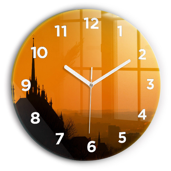 Round glass clock View of the Brno Cathedral