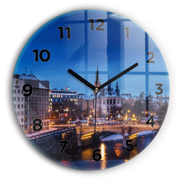 Round glass clock Panorama of the city of Pilsen