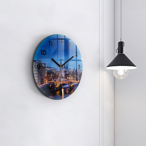 Round glass clock Panorama of the city of Pilsen