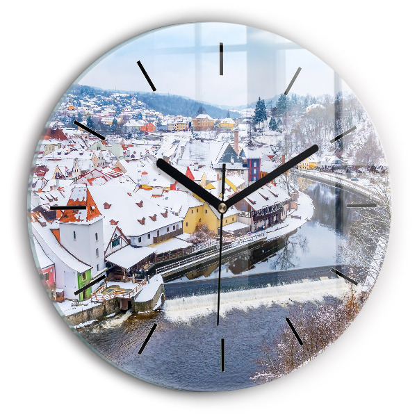 Round glass clock Panorama of the city in winter